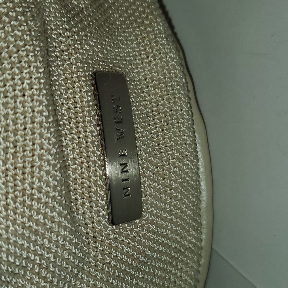 Nine West slouch hobo ecru faux leather shoulder strap. Pleated style